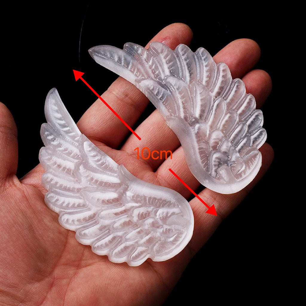 Selenite angel wing carvings