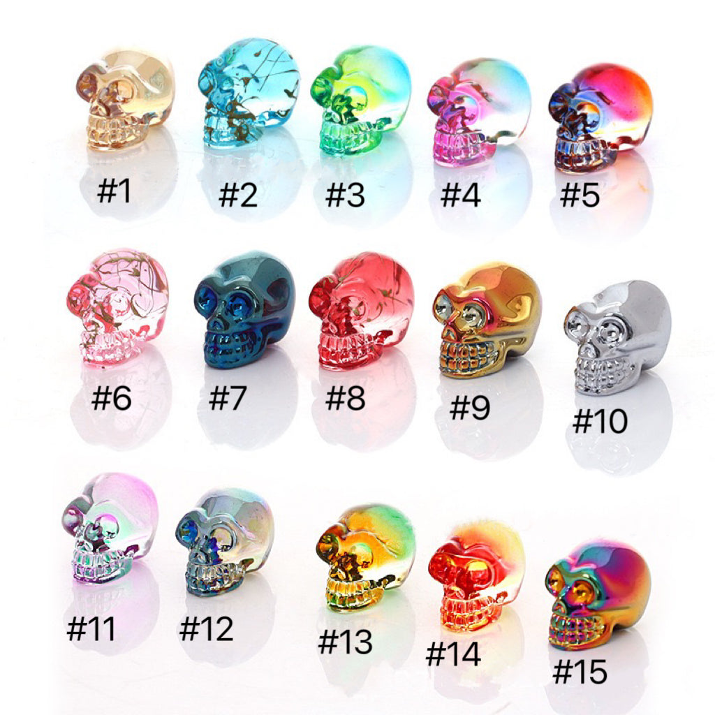Aura glass skull carvings