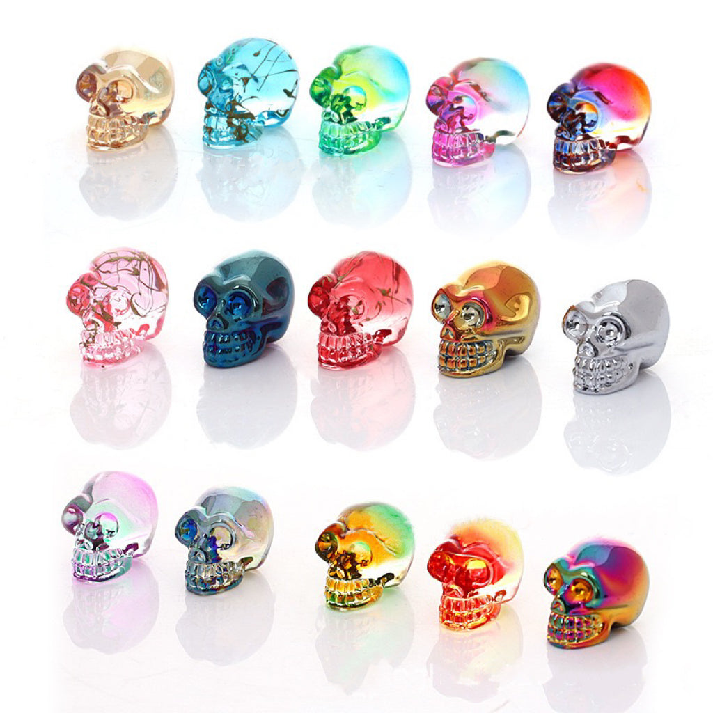 Aura glass skull carvings